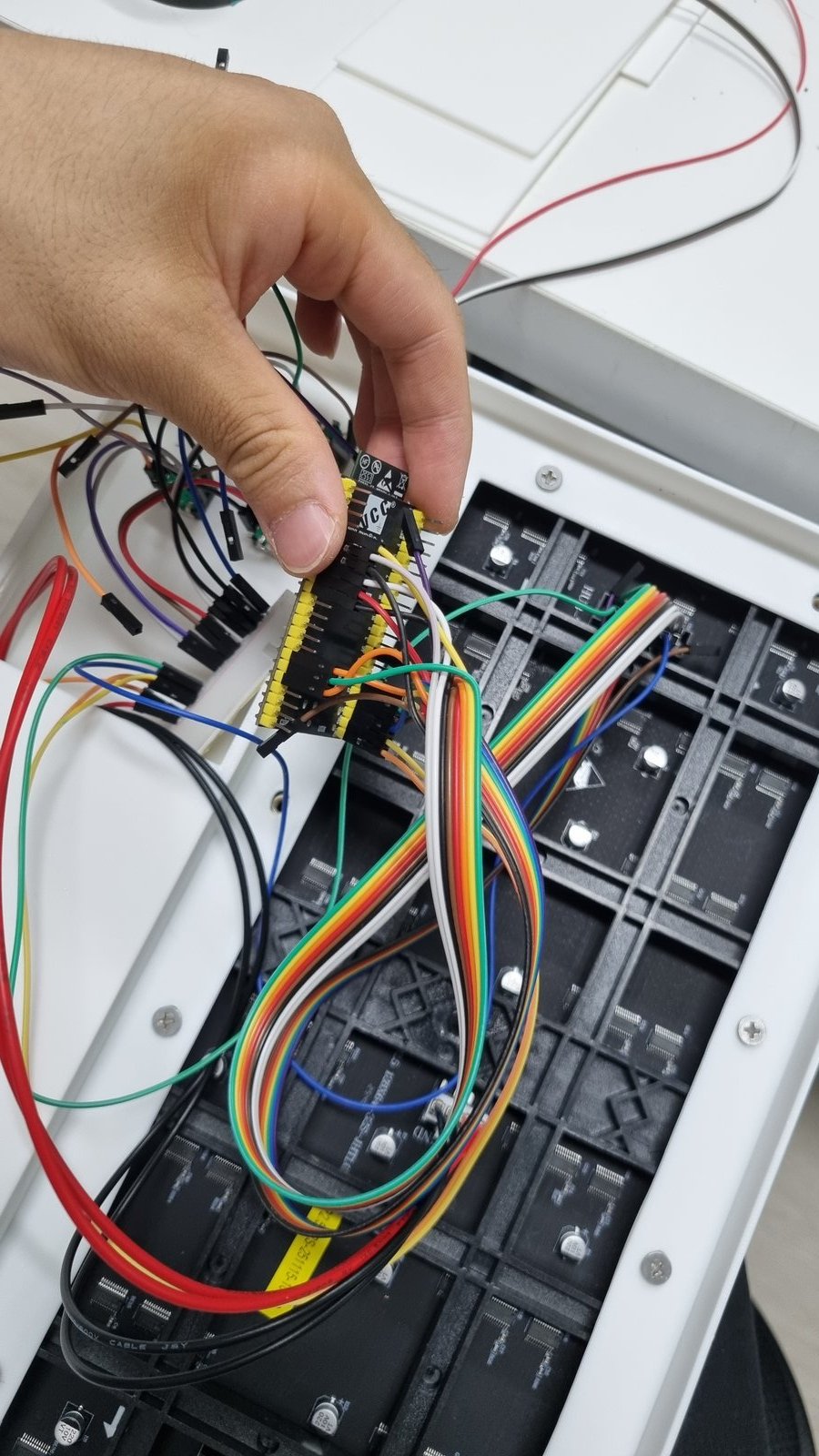 ESP32-S3 connected to the HUB75E LED matrix via ribbon cable